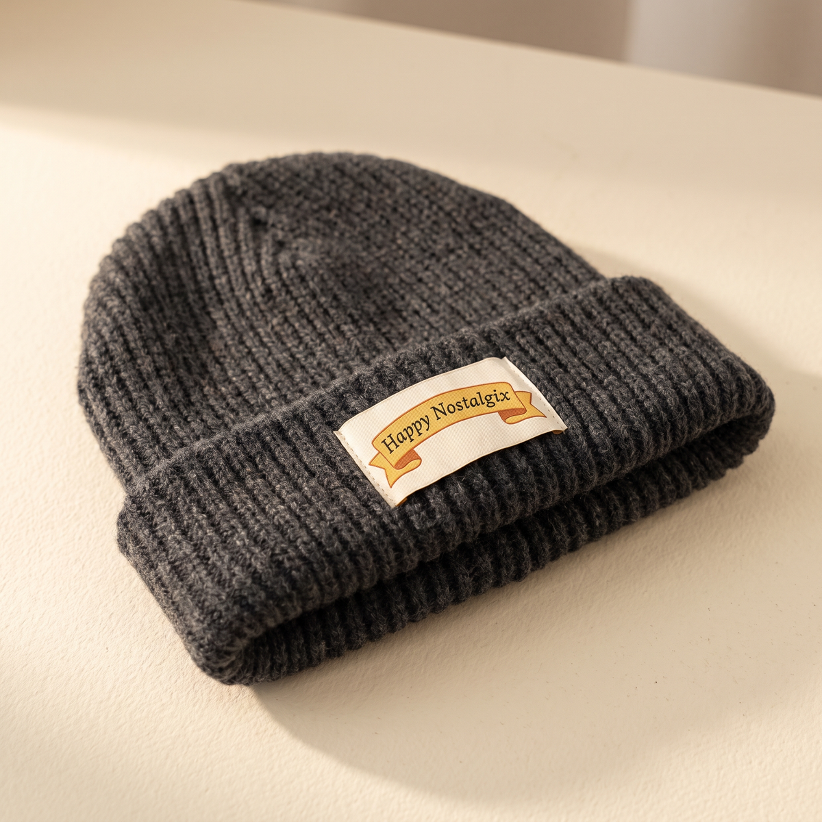 Happy Nostalgix branded knit beanie